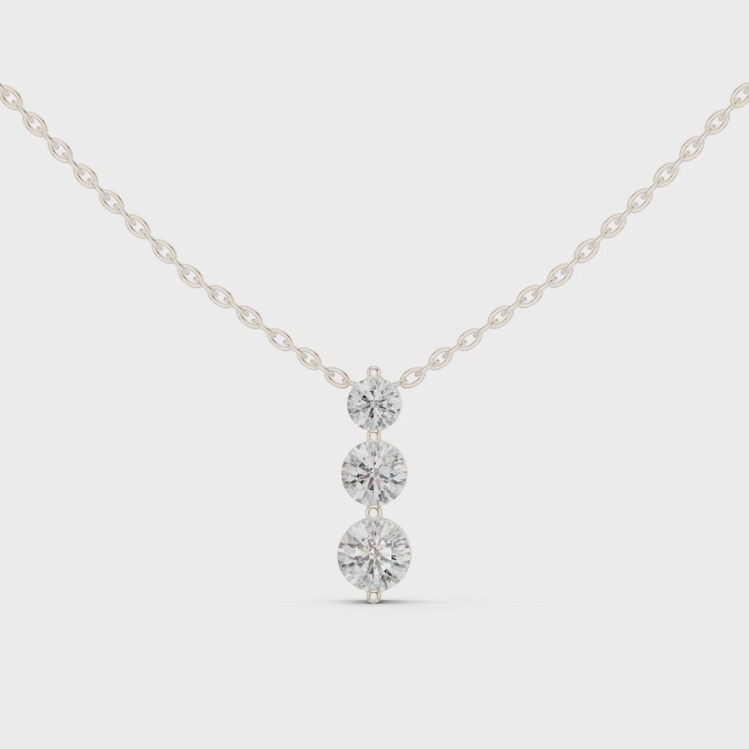 Elegant Triple-Drop Diamond Pendant in High-Polish Collet Setting
